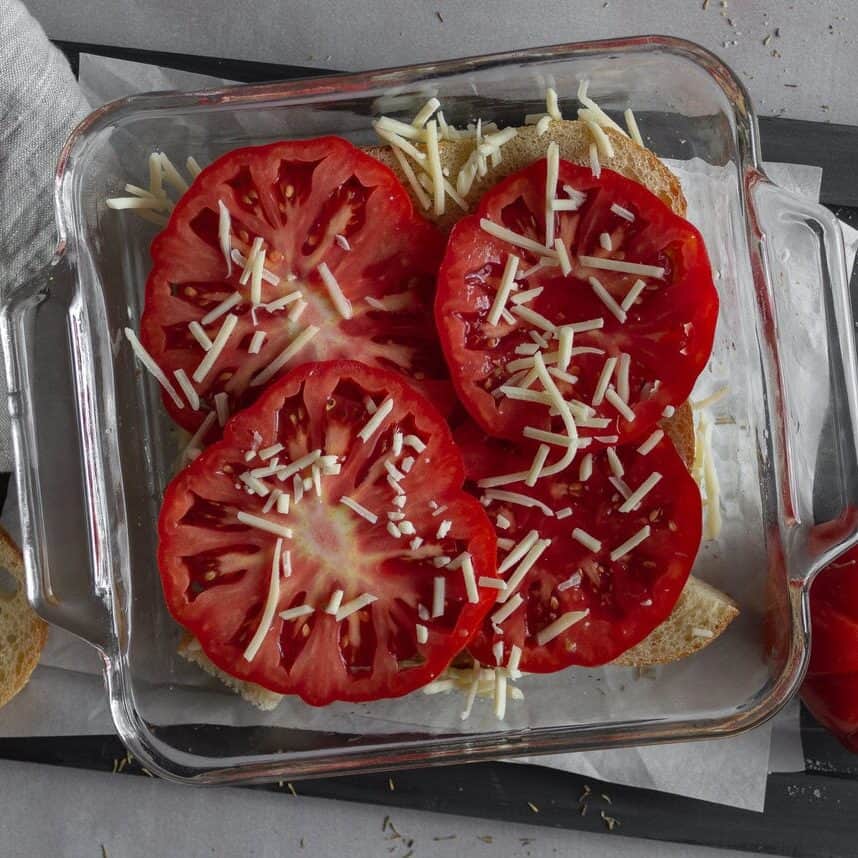 tomato slices and cheese in a casserole