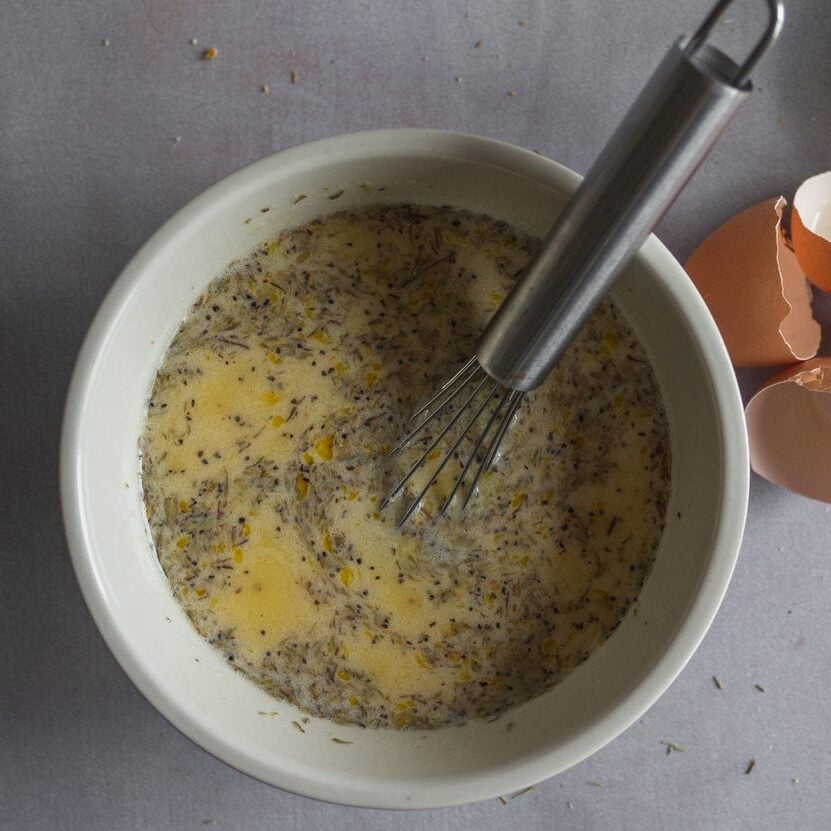 Egg and spice mixture with a whisk