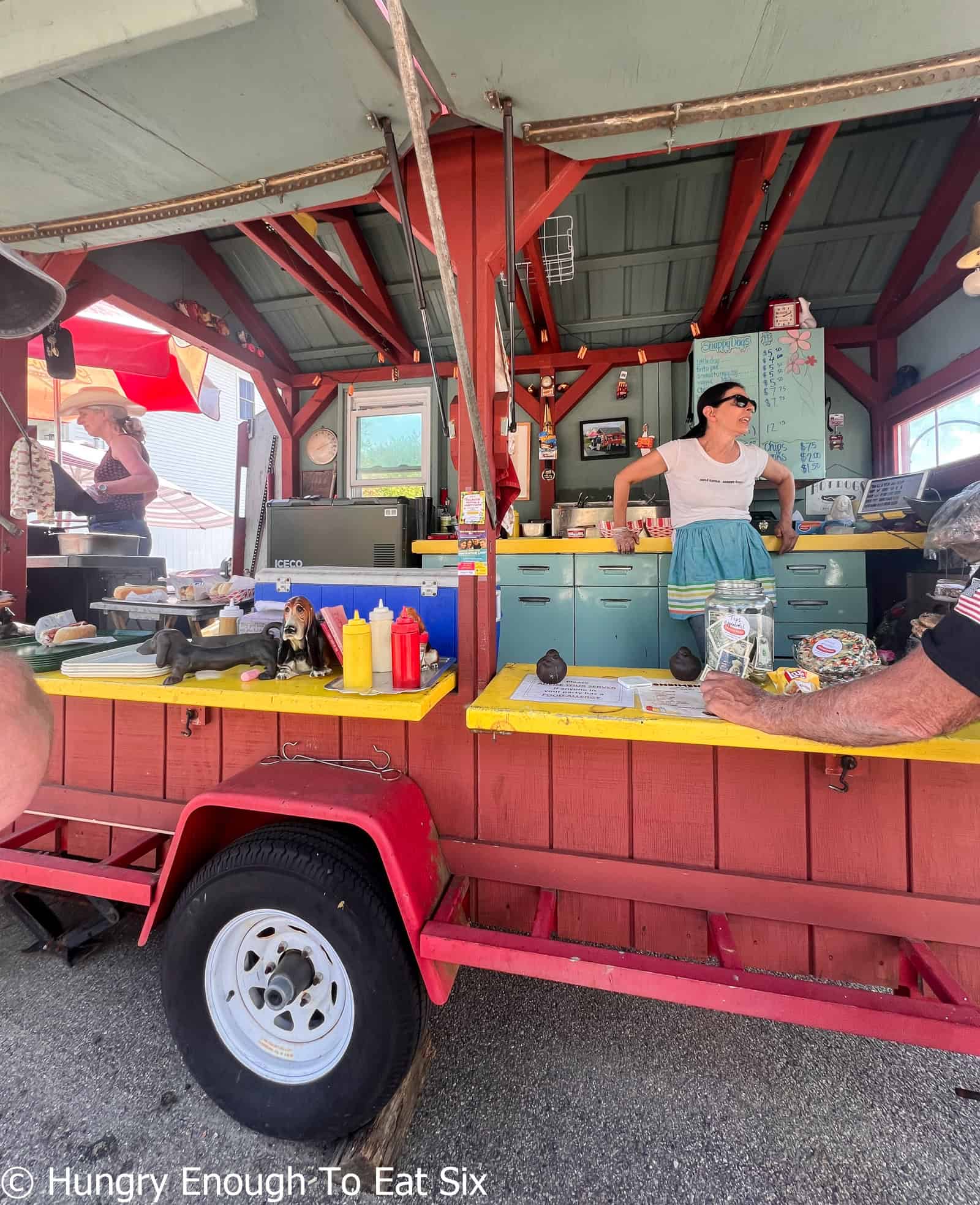 Owners inside Snappy Dogs, a central MA hot dog spot.