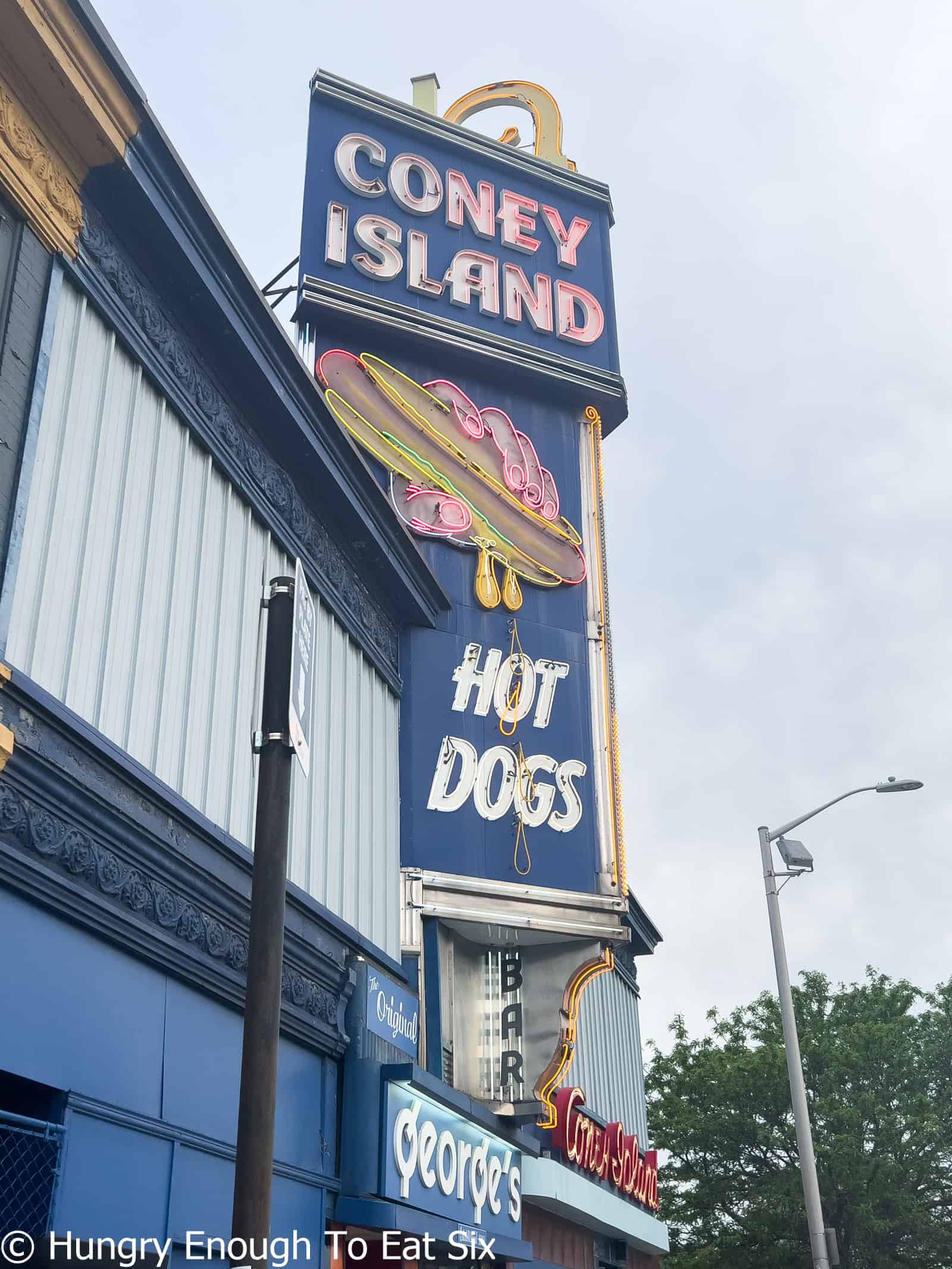 The neon sign at Georges Coney Island, a central MA hot dog joint.